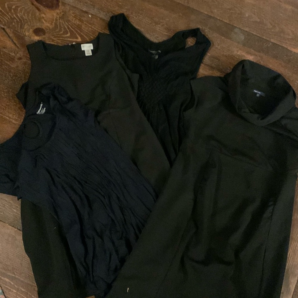 Group of four maternity dresses